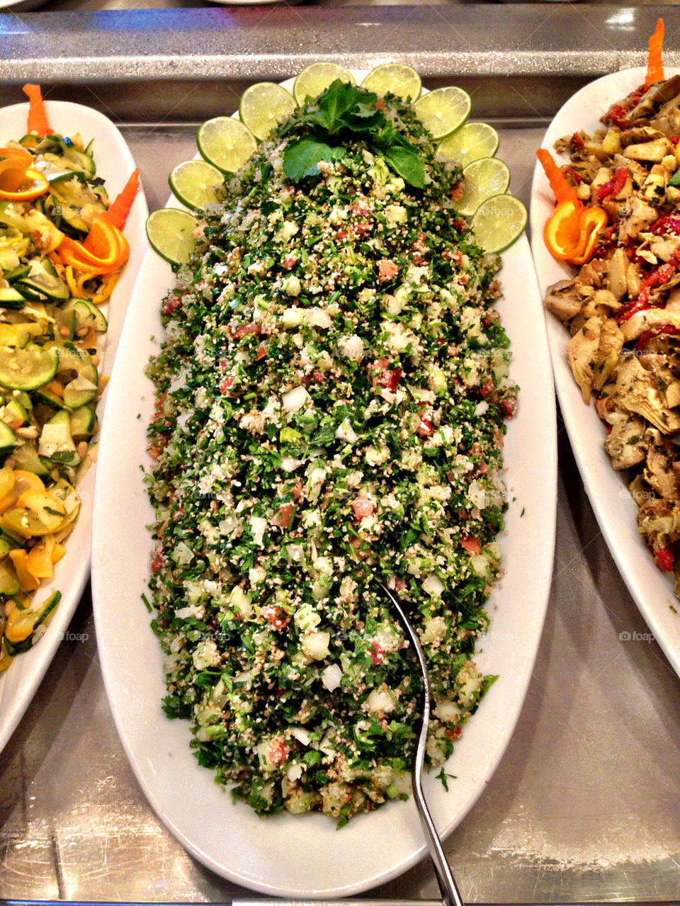 Tabbouleh tray in buffet table in restaurant