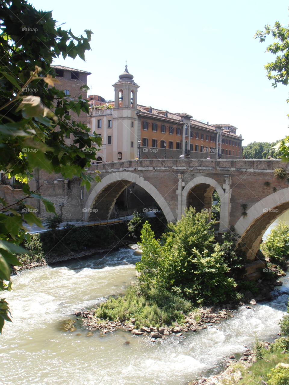 river bridge tiber island. rome. italy by photogecko