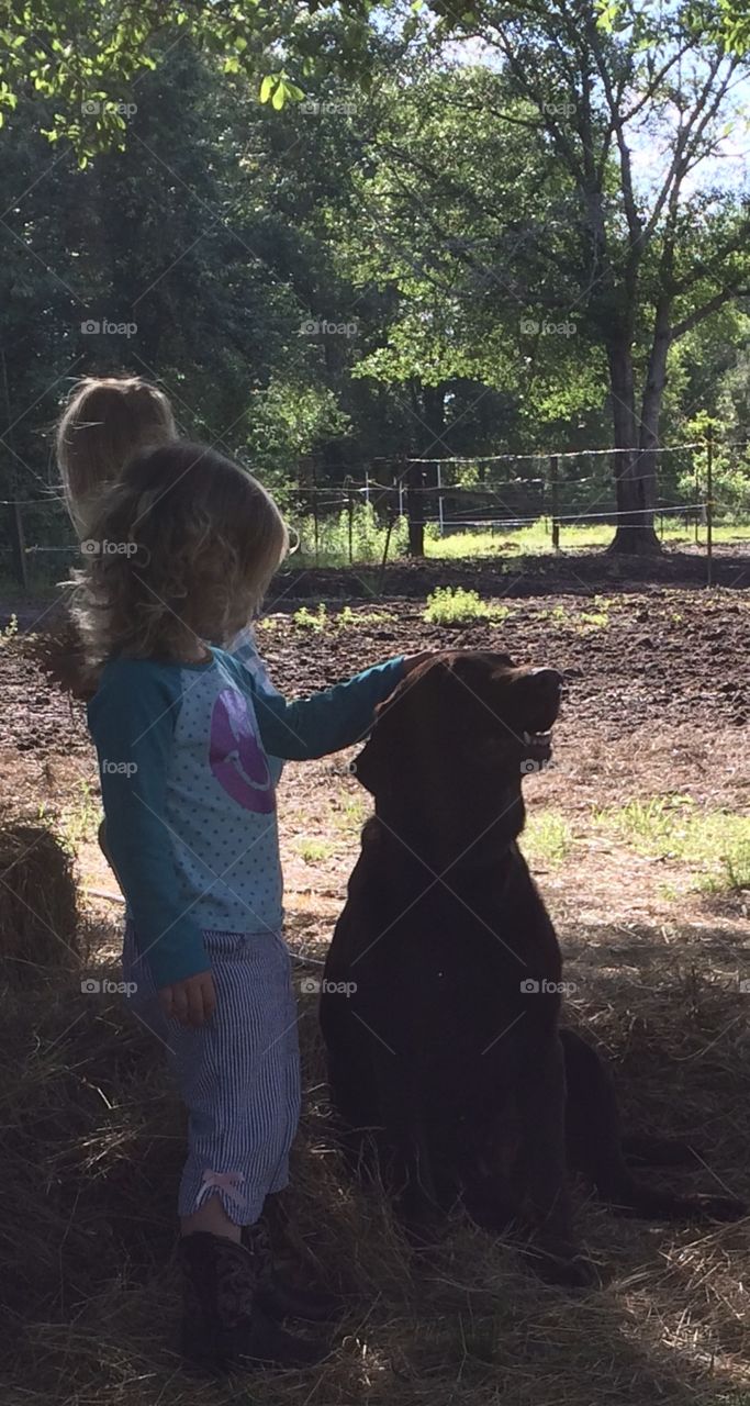 Choco the farm dog and his little girl 