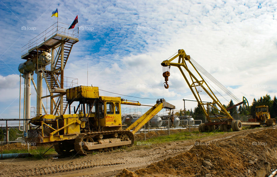 Bulldozer and crane, heavy machinery