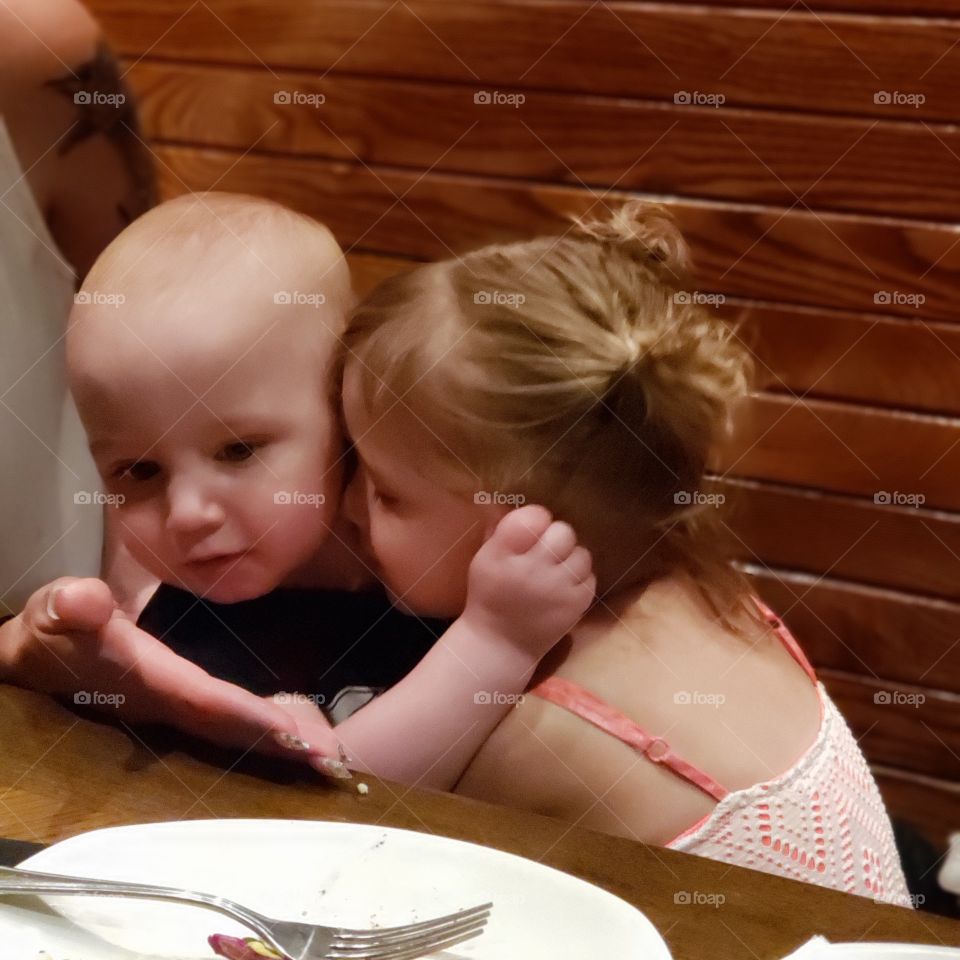 My nephew and daughter hugging it out