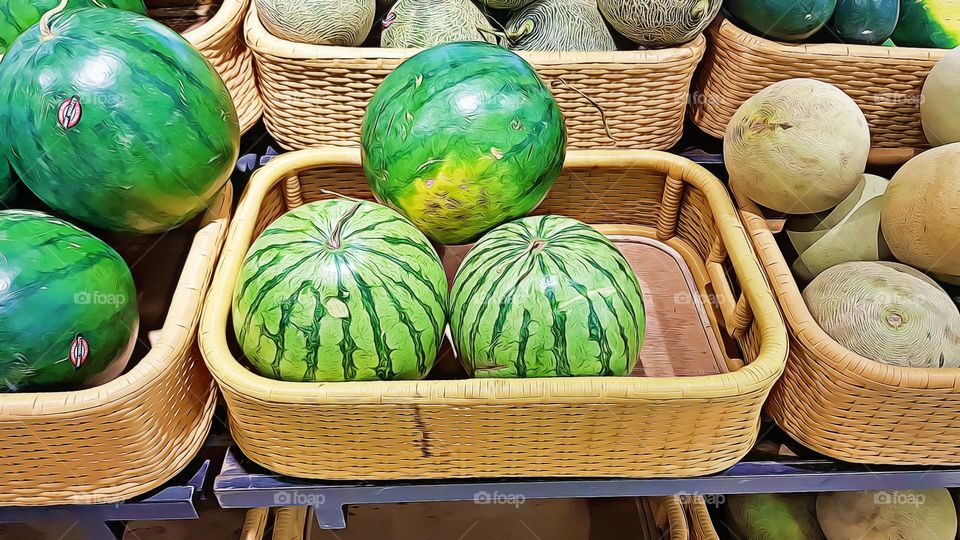 water melon in basket, ready for sale, fresh green fruit, rich in vitamins, rich in water and other minerals, diameter 20 - 25 cm, basket waith woven wood motif, made of plastic, factory made, melon contains lots os vitamin, A B C and conntains prosp