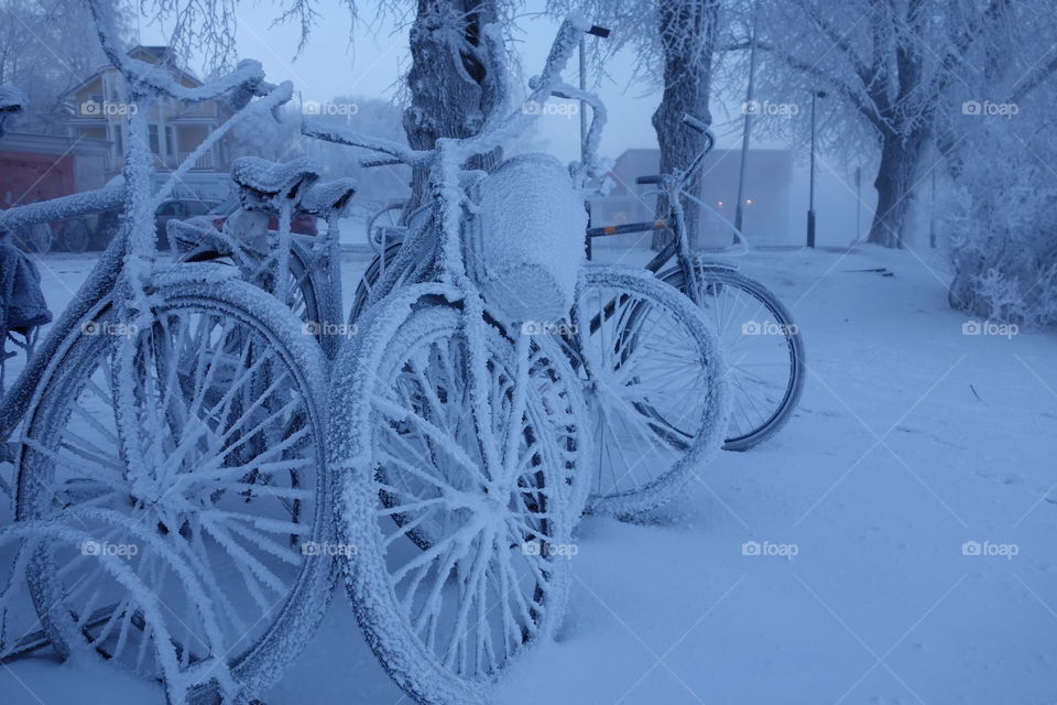 Frozen bicycle on extremely cold winter morning in Helsinki, Finland