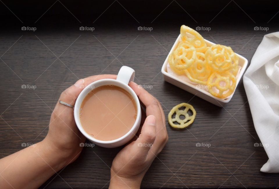 Cup of tea with snack