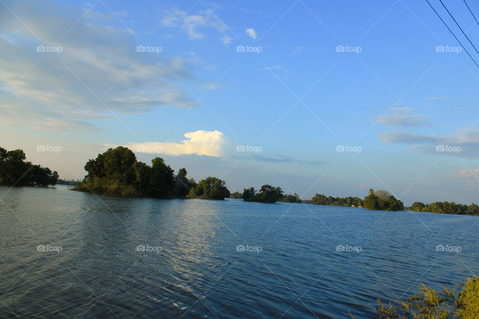 The water from the river flooded the farm.  most beautiful palace in kerala, alappuzha