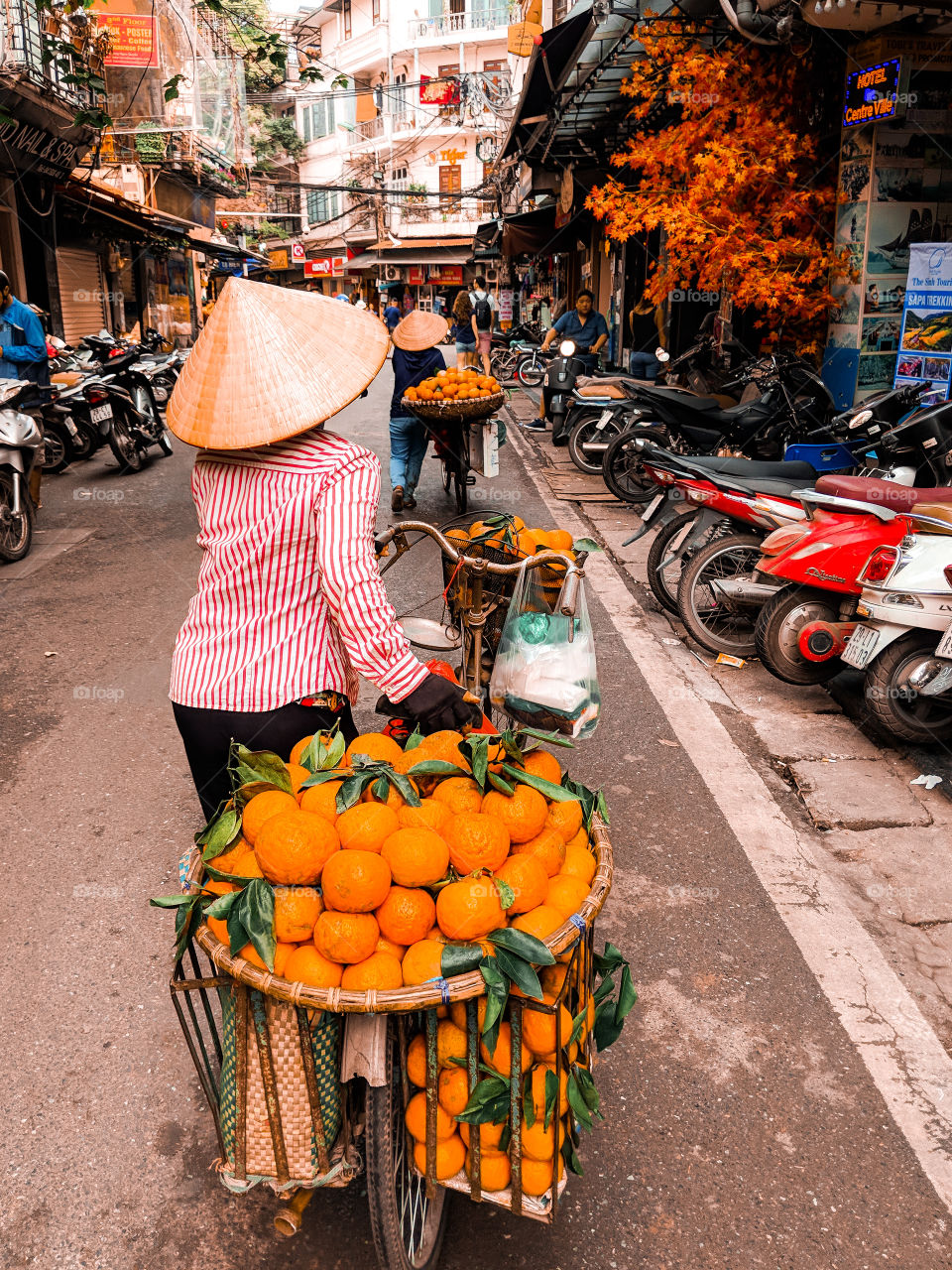 Orange market on bikes