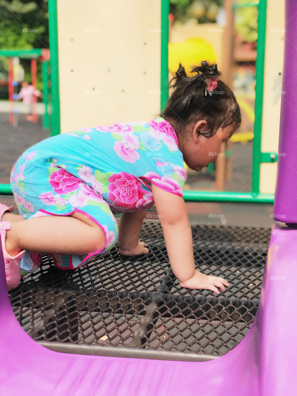 Nothing is better than to be at the playground for this lovely cute girl. She loves running, jumping, playing, smiling, laughing and everything about playground. Look like she really enjoys and receive so much happiness from this playground. 