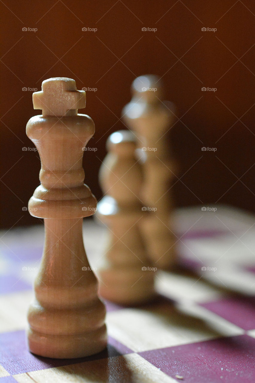Close up of a few chess pieces
