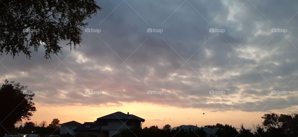 House in golden hour with beautiful sky