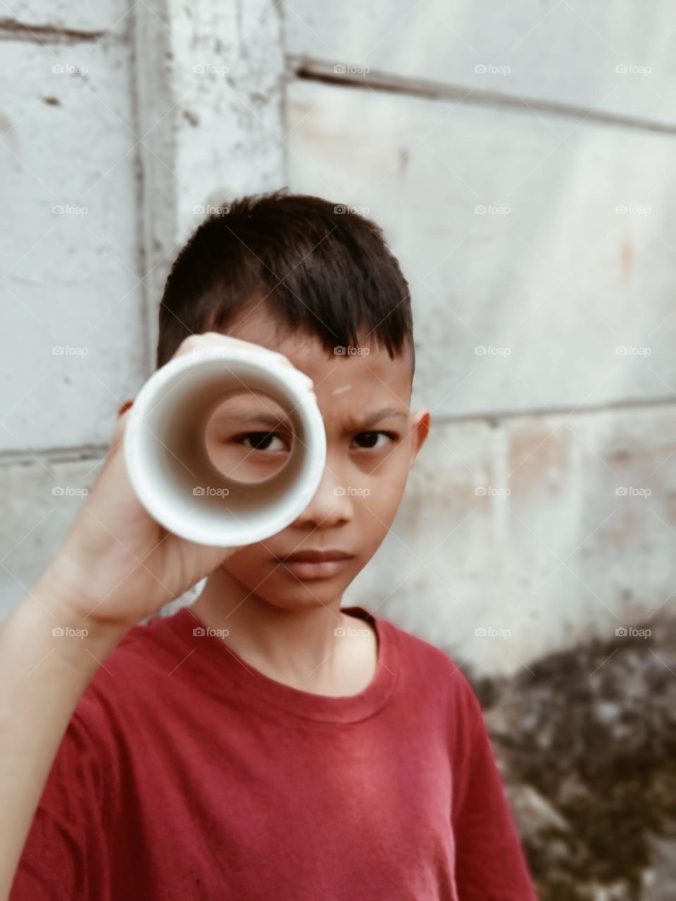 Boy with his rounders toy
