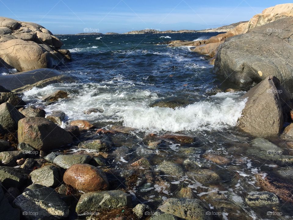 Wave and rocks at sea