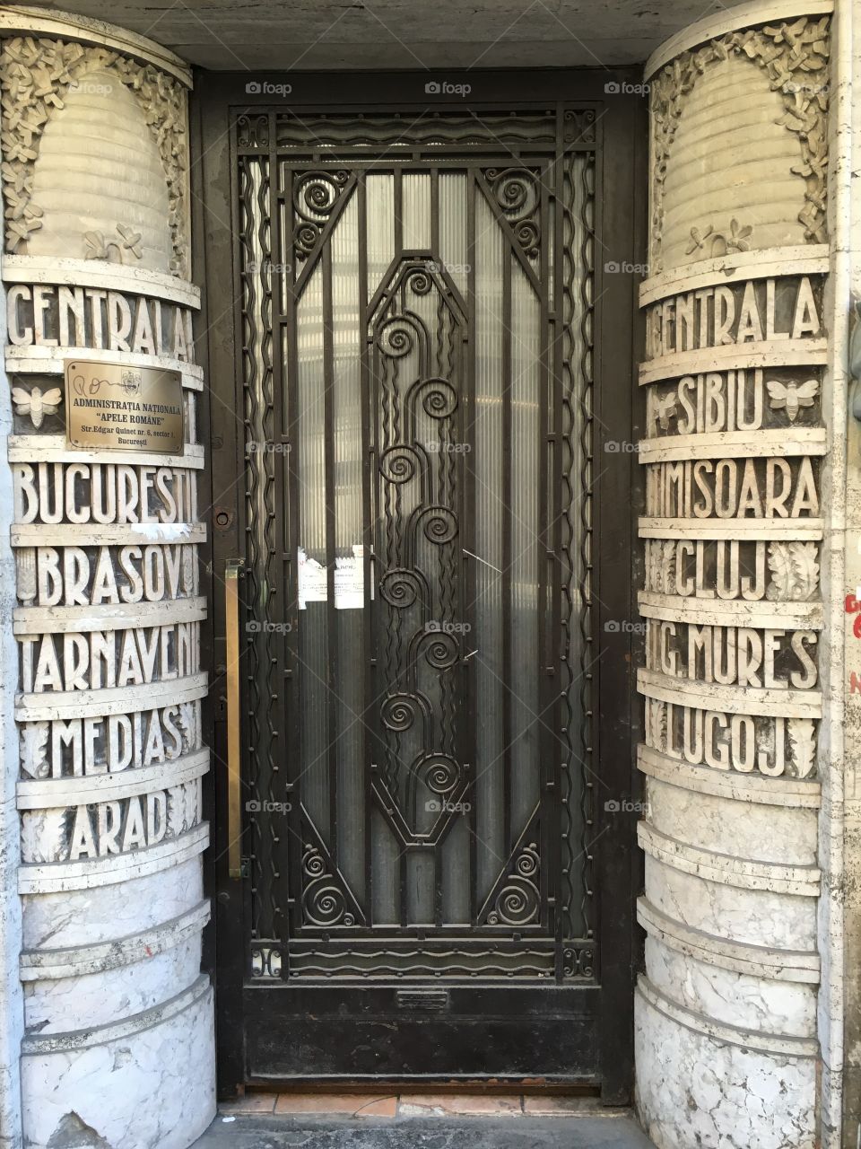 Unique style with ornamental city names carved on two columns, Bucharest, Romania