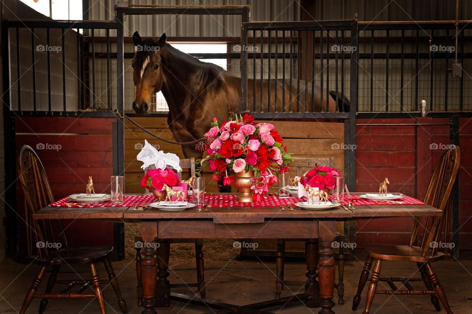 Decorative table in a horse stall