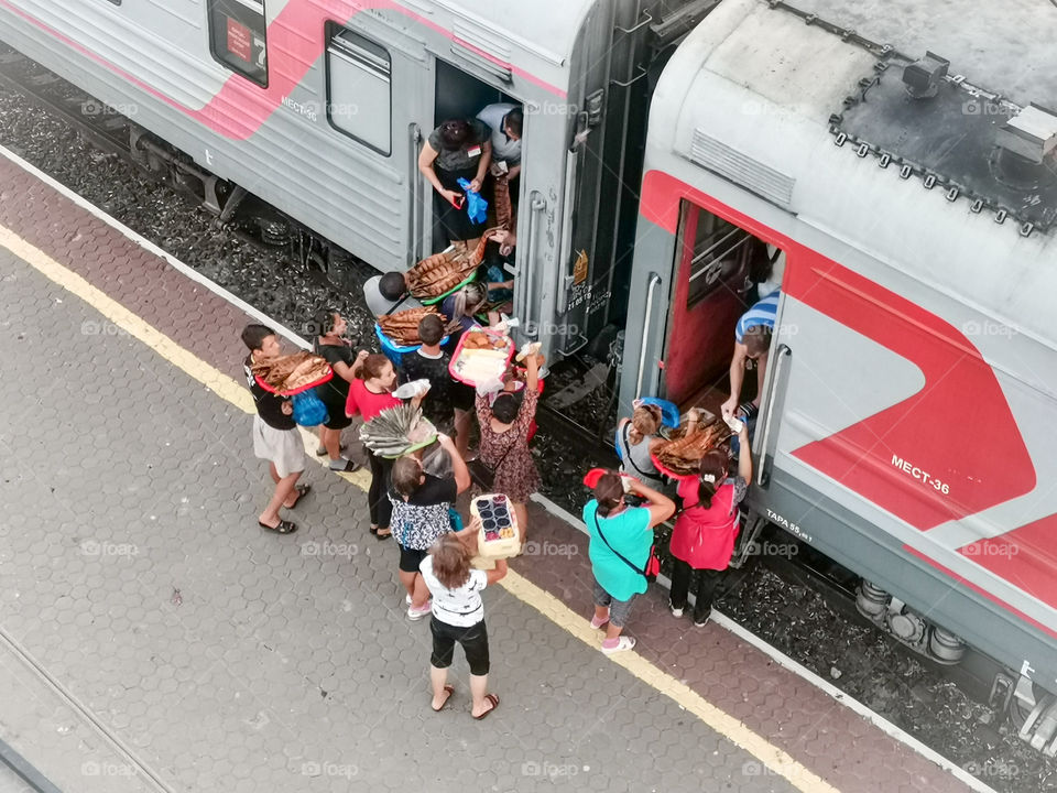 Selling goods during a train stop