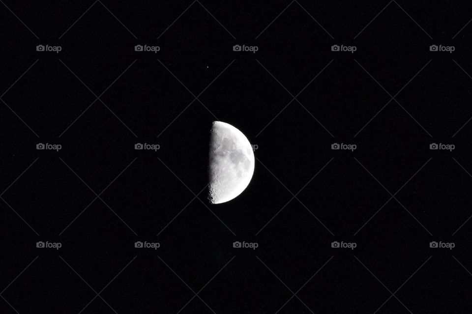 Half moon with tiny star
