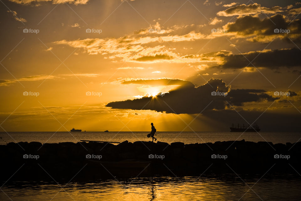 walking man sunset