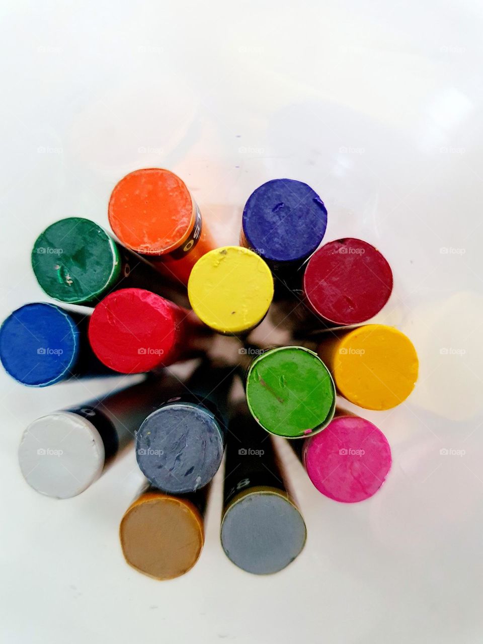 circles - several colorful mixed wax crayons