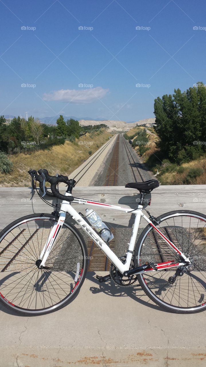 Road Biking Over the Train Tracks