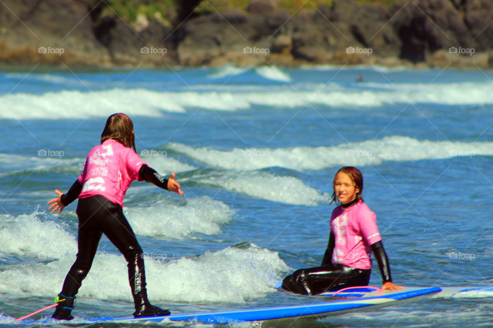 Staying in shape means surfing! We go every year for a family trip and the girls surf, we play in the waves & on the beach and enjoy being together! My youngest is giving her big sister a hard time for getting a little too close! Hah!!!πββοΈ