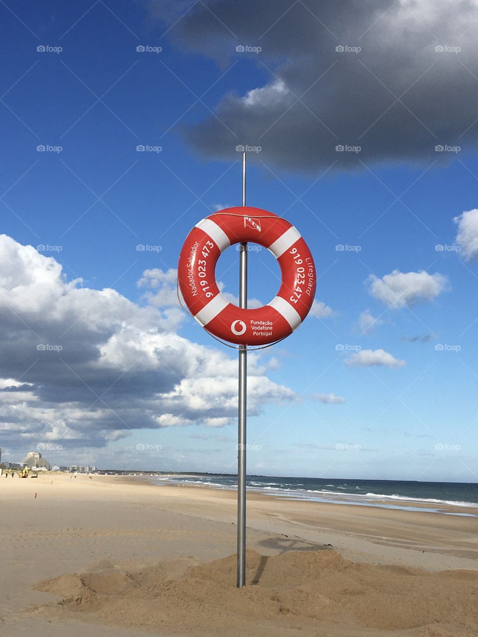 Lifeguard symbol as a circle on beach