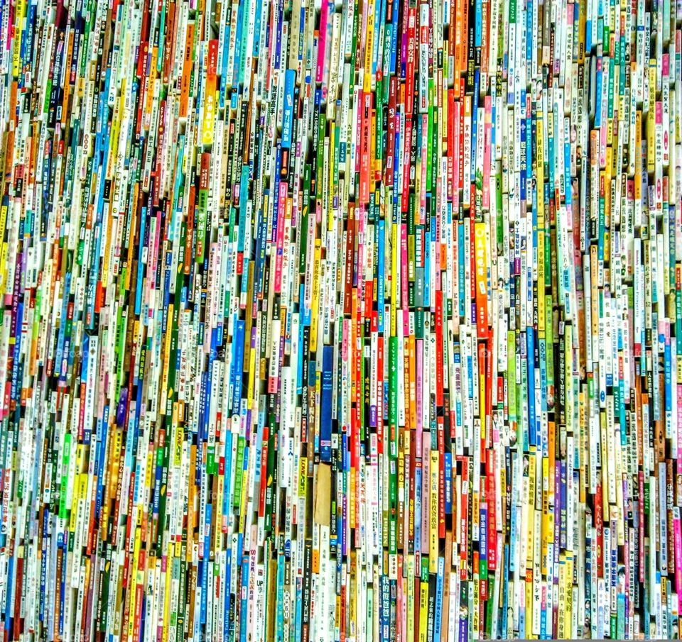 The books in library wall. it looks like an art of books. very interesting.