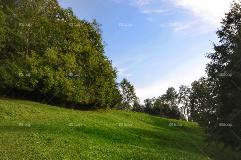 Mountain slope in summer time at the sunset 