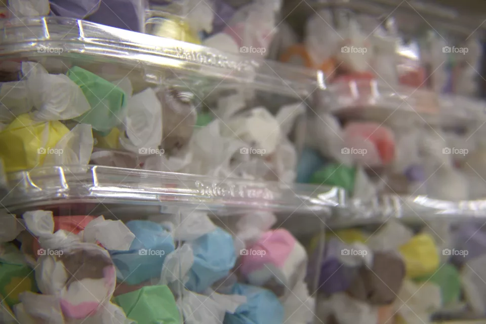 Colorful Sea Salt Taffy in Stacked Plastic Containers