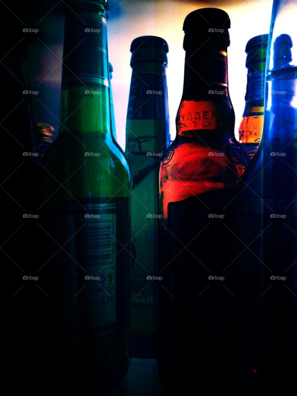 Beer. Beer bottles in light