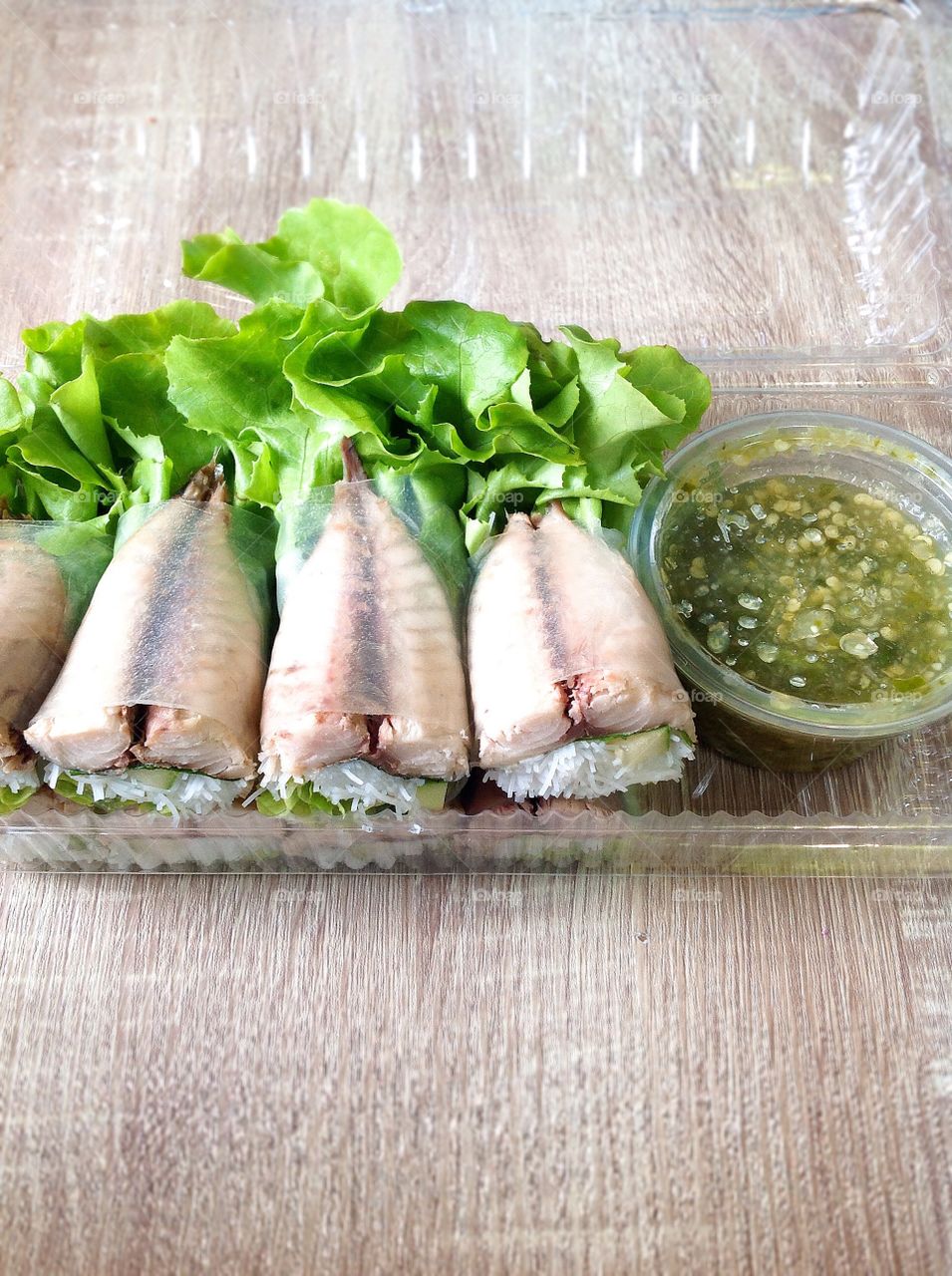 Healthy foods ,salad roll with spicy sauce 