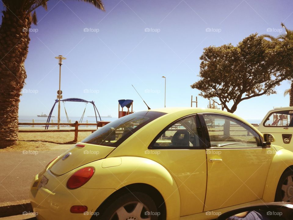 Yellow car beachfront SOUTH AFRICA