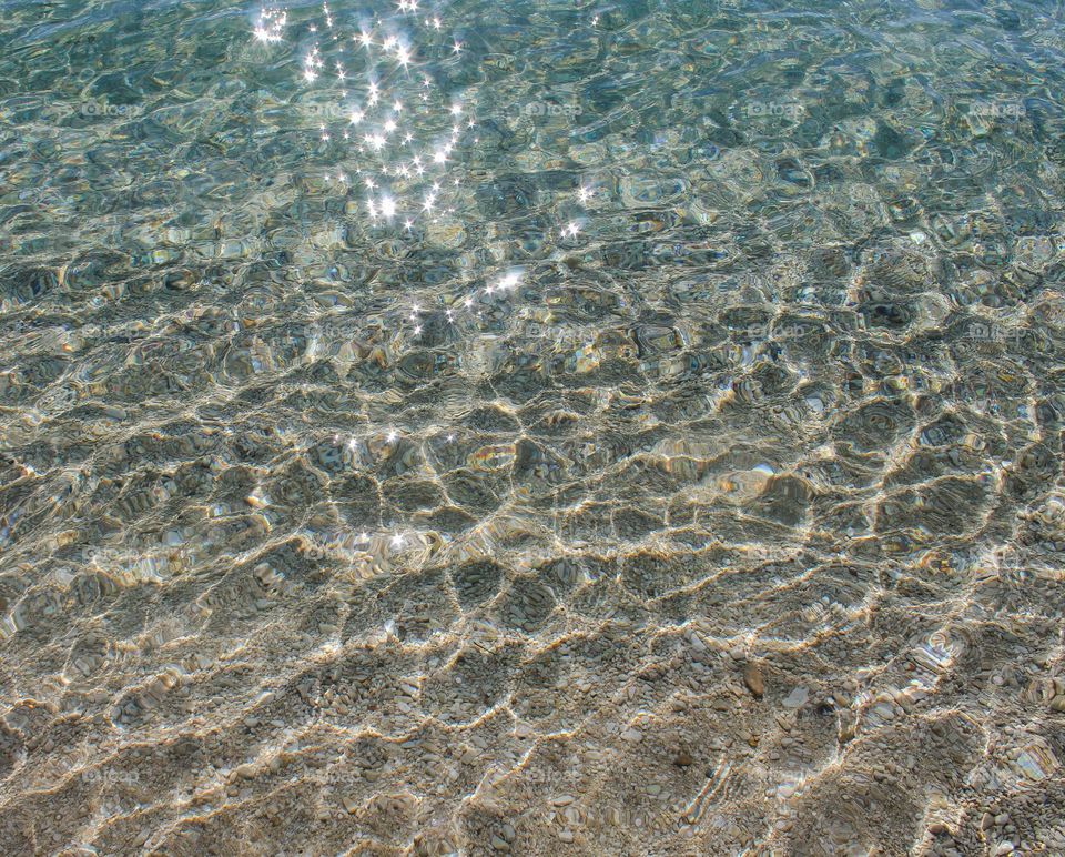 A view from above of the full frame of the sea.  Tranquility scene , sunny light