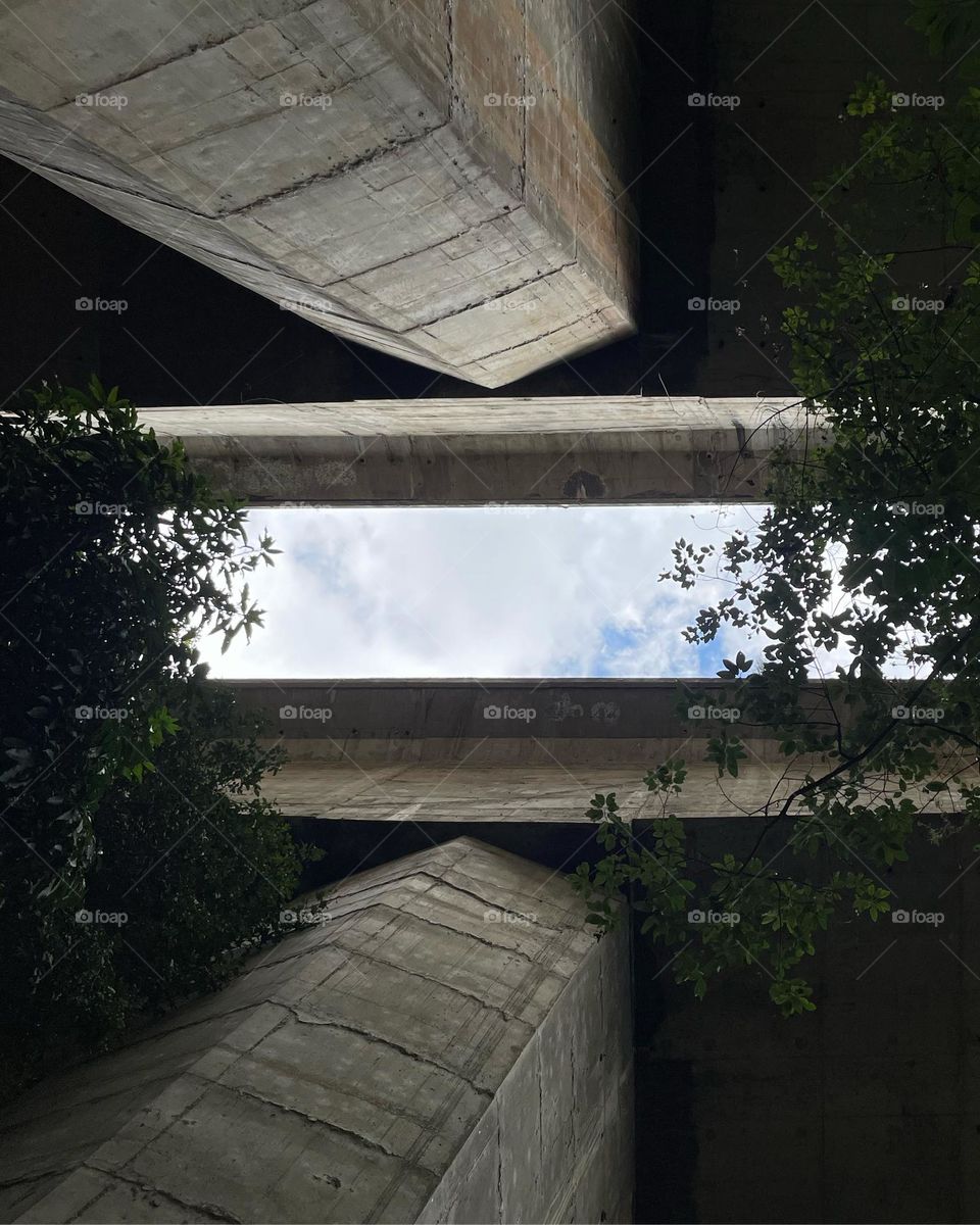 Under the highway. Calm. Focus. Sky. Lines.