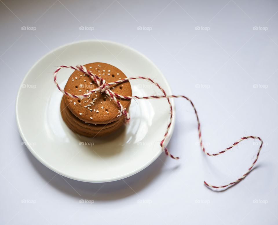 Christmas gingerbread gift isolated on white