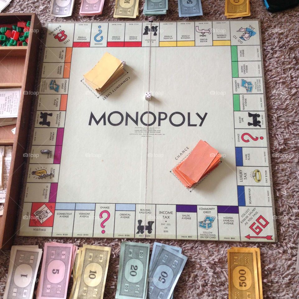 Monopoly board game is set up and ready to play.