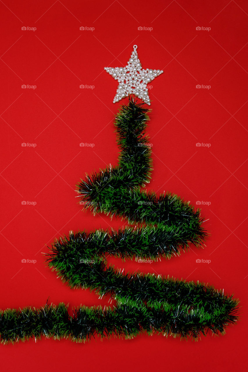 Christmas tree made of fir with star on top