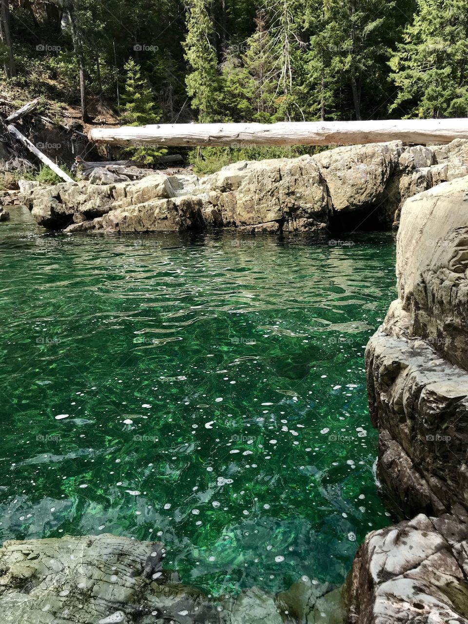 Natural emerald pool, sparkling in the sun.