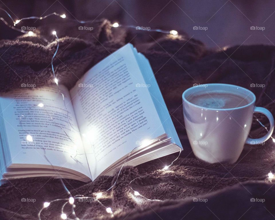 Moody winter with cappuchinno and a book.