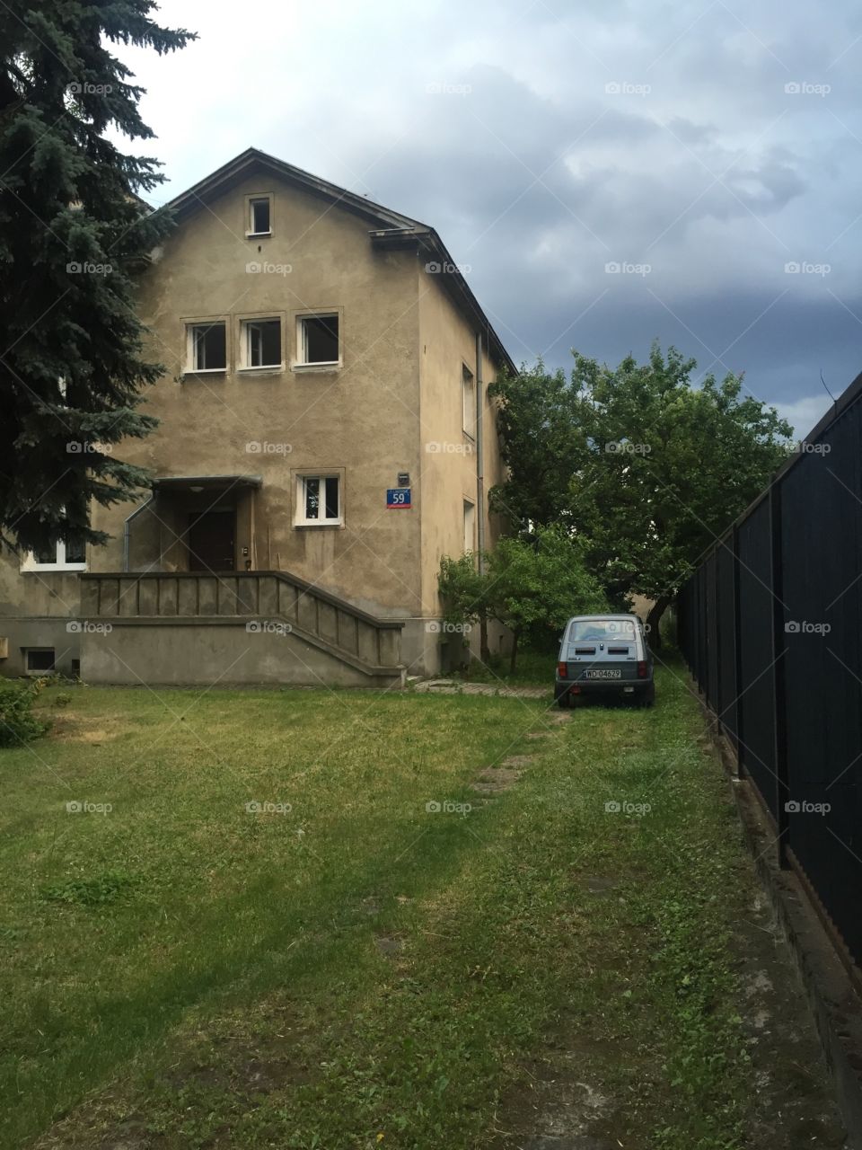 Villa and a retro car in the yard