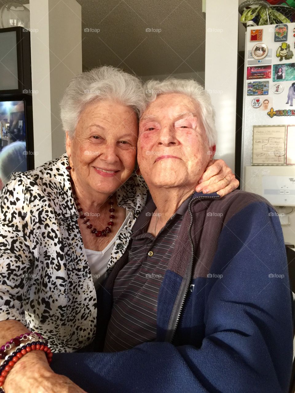 Senior Couple. Portrait of senior couple in the kitchen of house