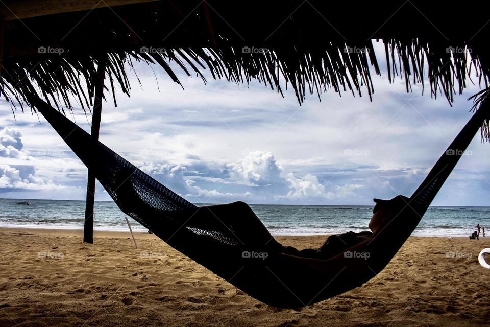 Woman relaxing on the beach