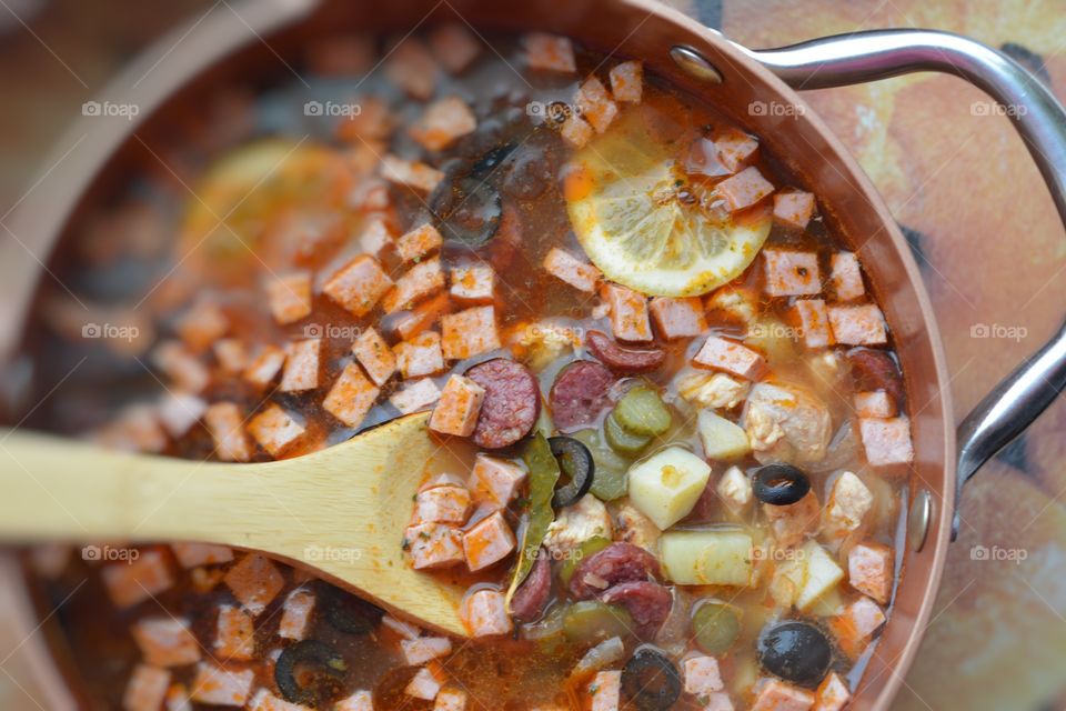 Preparing food in cooking pan