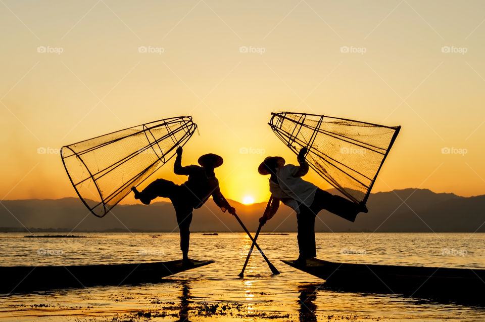 Fishermen traditional pose in Myanmar 