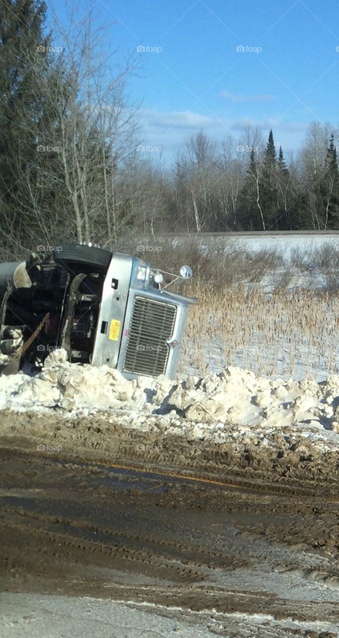 In the ditch. Truck roll over