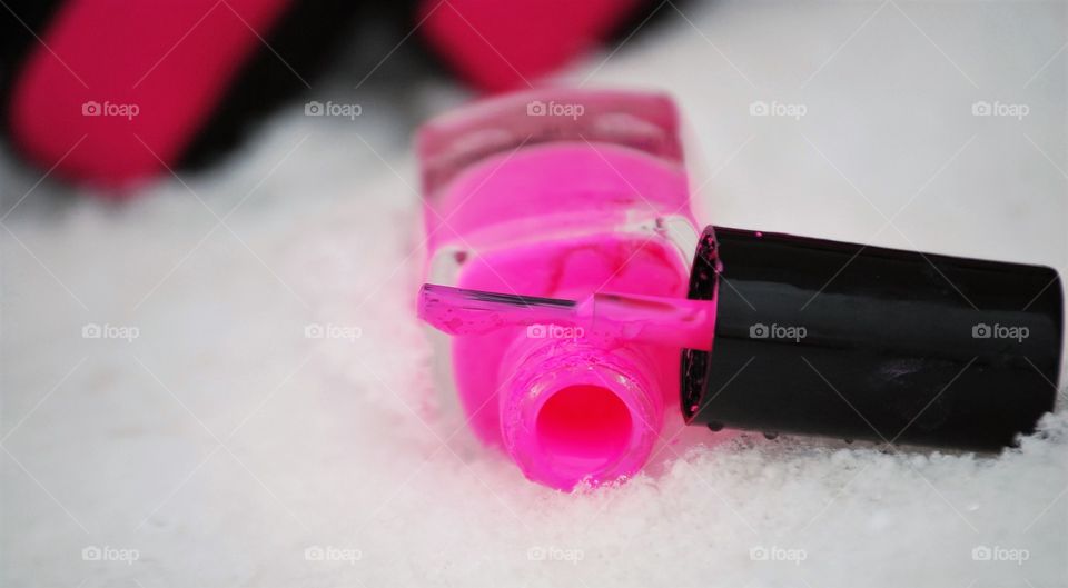 Pink nail polish 
