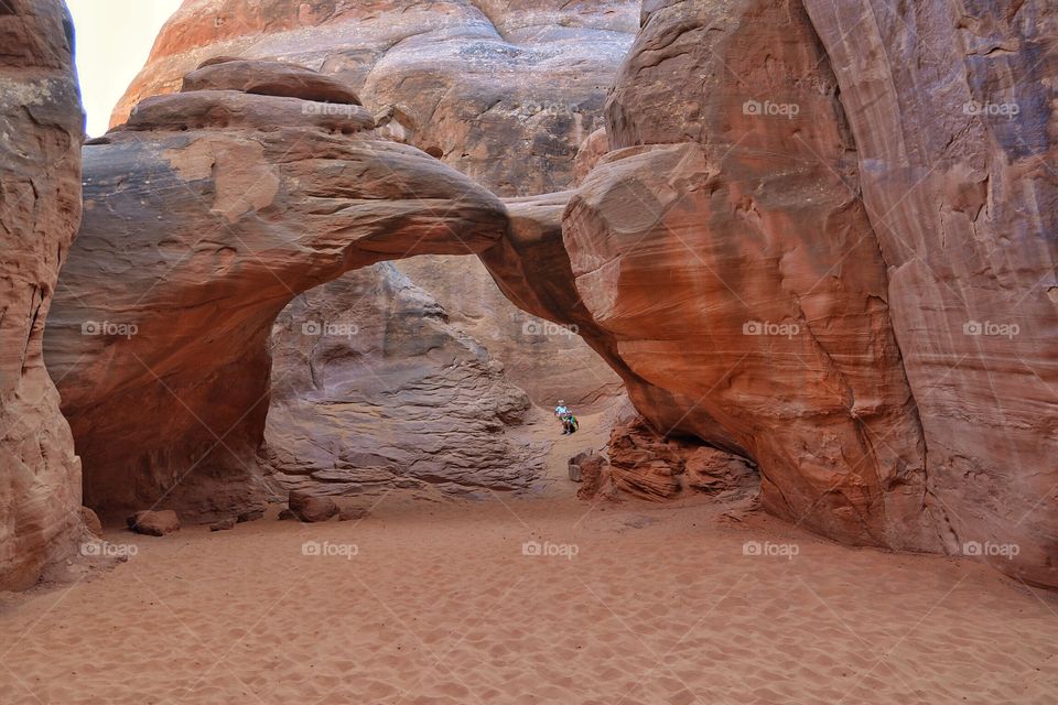 Playing in the sand at Arches National Park