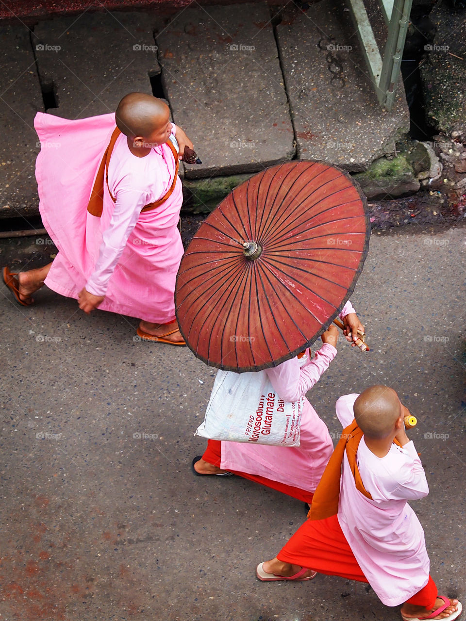 Burmese nuns walking for charity collection