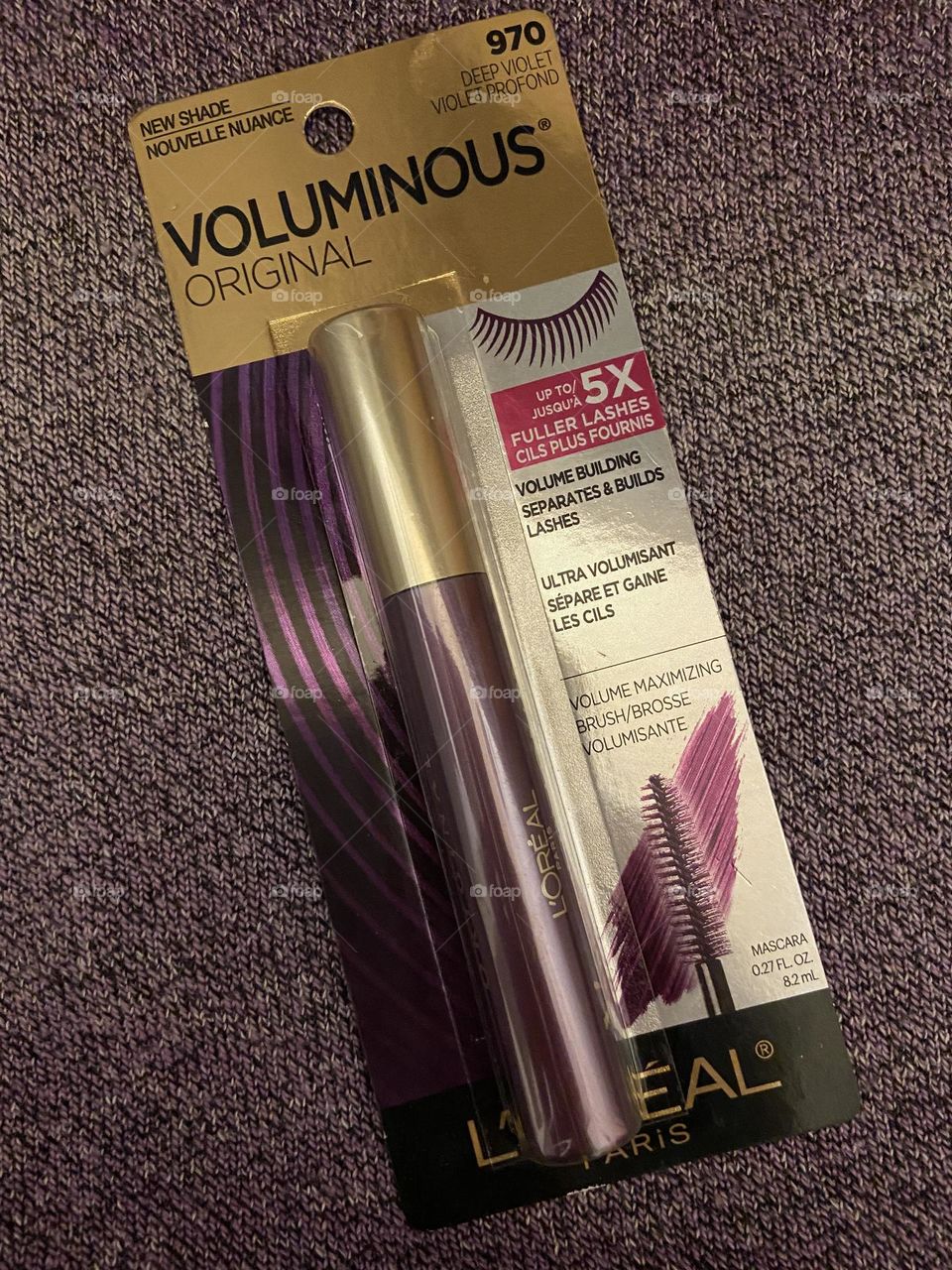 L’Oréal Voluminous Mascara in Deep Violet against a violet/gray background. These colored mascaras are fun but also not too over-the-top. Since they go on black lashes, they just add an accent that to me is a nice change from traditional black. 