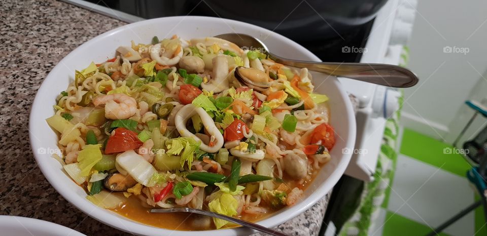 Delicious home made seafood noodle broth