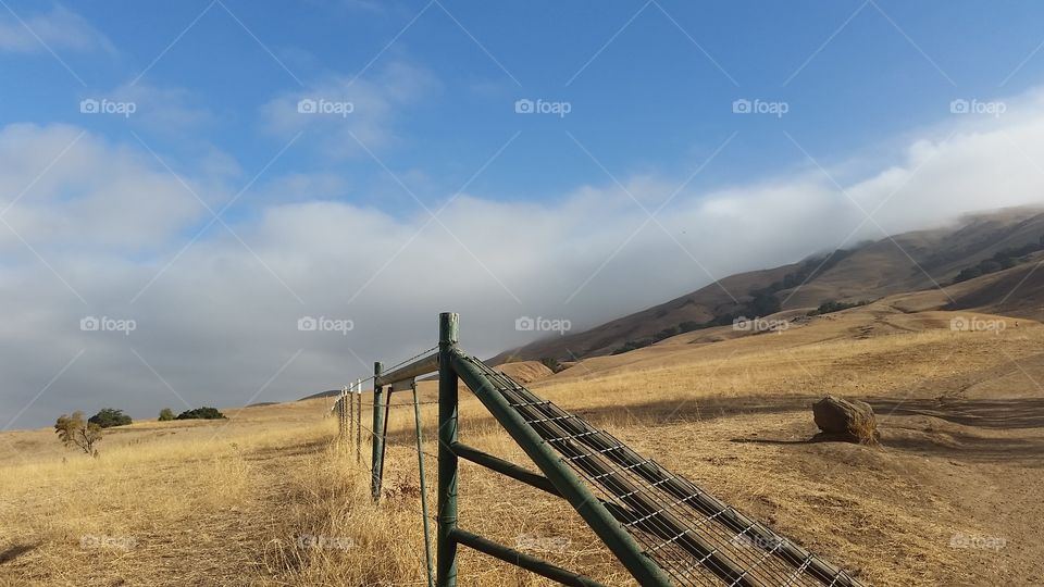 Fence on ranch. Broken fence in a ranch