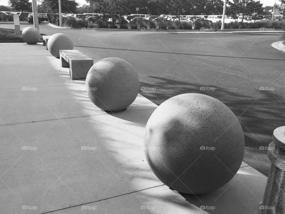 Concrete balls and bench urban style 